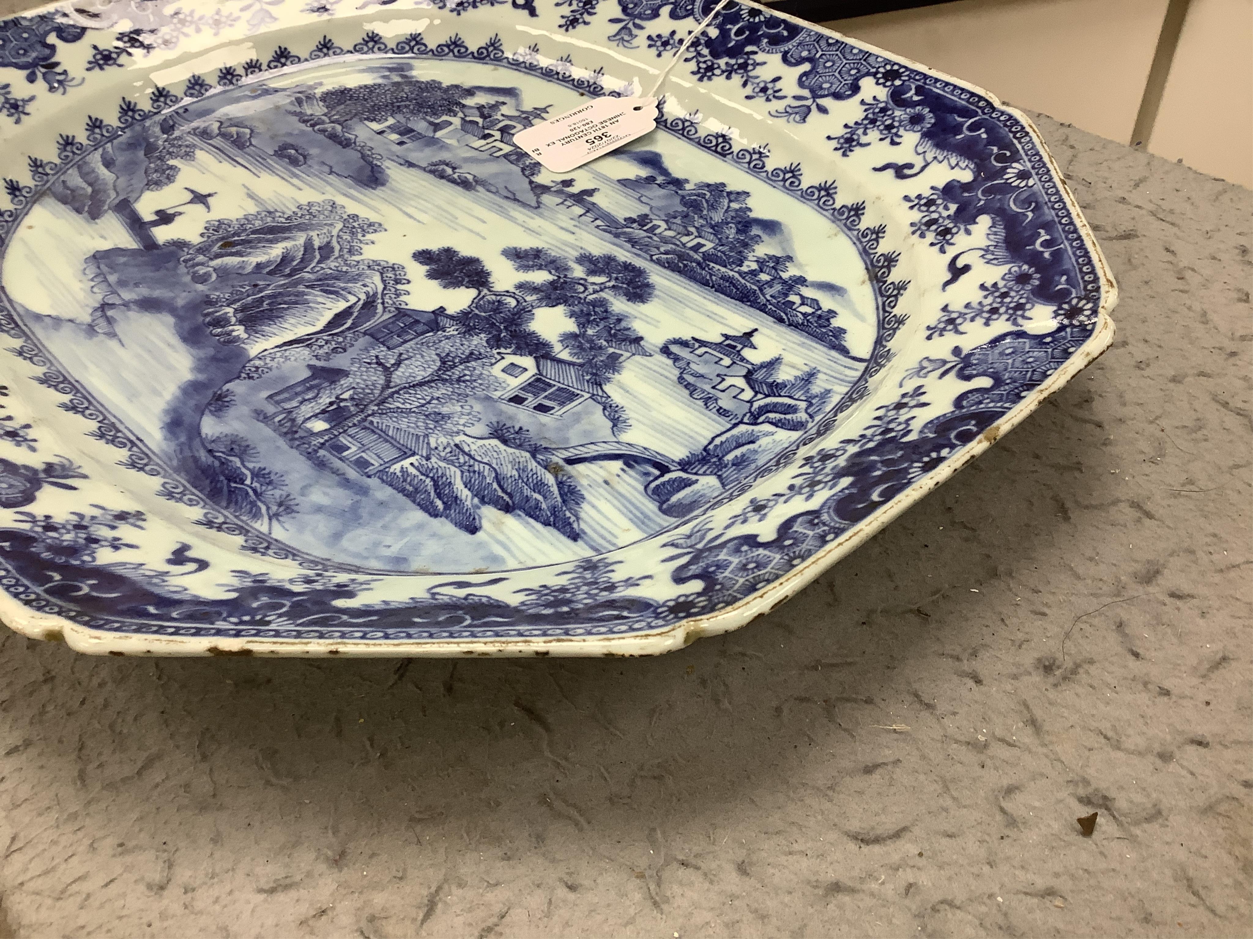 An 18th century Chinese octagonal export blue and white dish, 41cm wide. Condition - fair